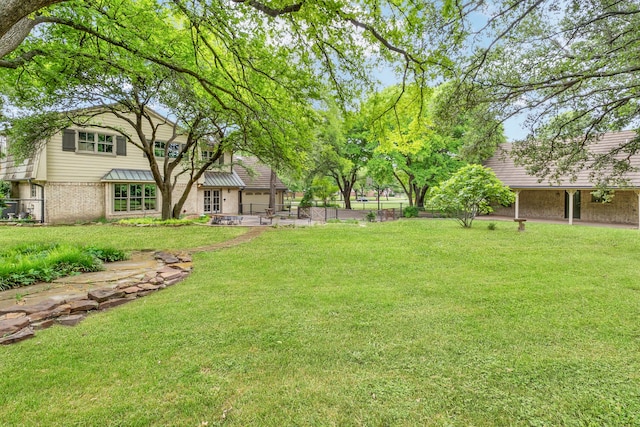 view of yard featuring fence