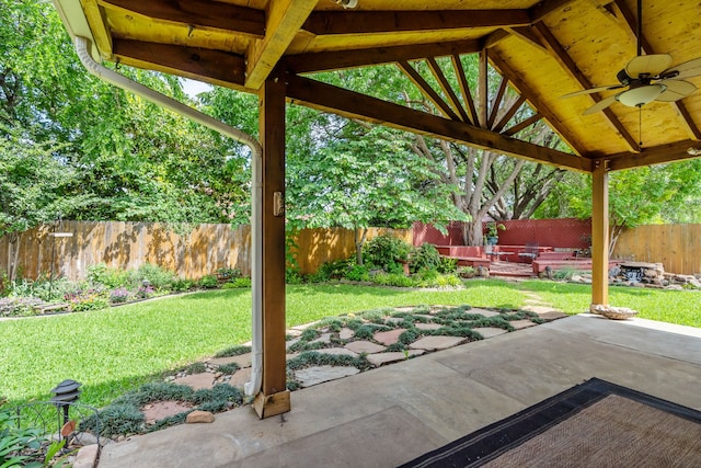 view of patio with a fenced backyard, a gazebo, and ceiling fan