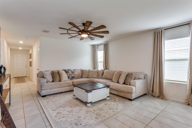 living room with visible vents, recessed lighting, ceiling fan, and light tile patterned floors