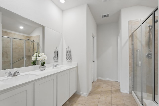 901 Cherry Blossom St, Anna, TX 75409 - bathroom featuring visible vents, a sink, and a stall shower