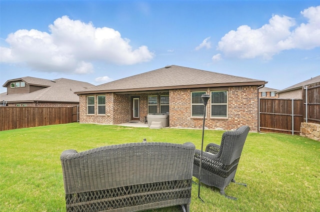 901 Cherry Blossom St, Anna, TX 75409 - back of house with a fenced backyard, a patio, a lawn, and brick siding