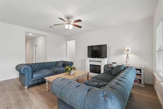 901 Cherry Blossom St, Anna, TX 75409 - living room featuring baseboards, a ceiling fan, wood finished floors, and visible vents