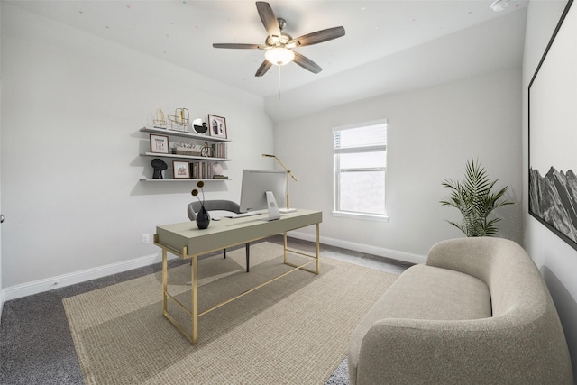 home office with carpet flooring, ceiling fan, and baseboards