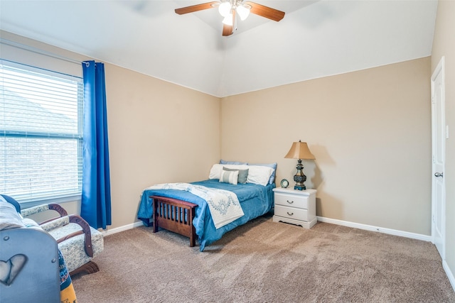 bedroom with baseboards, multiple windows, ceiling fan, and carpet
