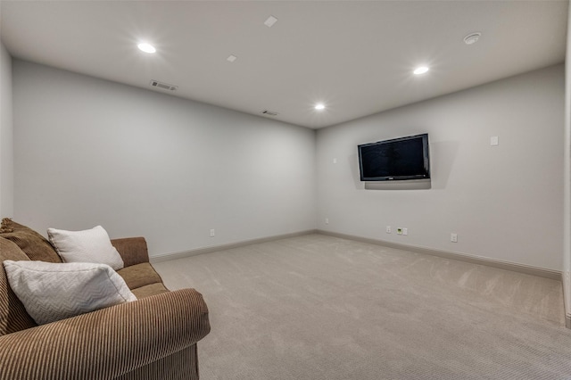 interior space with baseboards, visible vents, recessed lighting, and light colored carpet