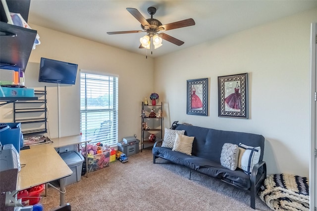 rec room featuring carpet and ceiling fan