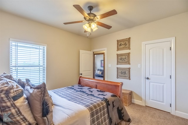 bedroom with baseboards, light colored carpet, and ceiling fan