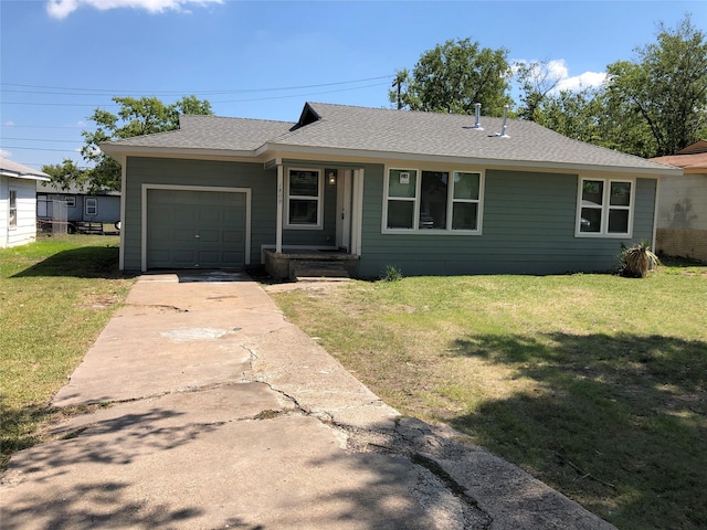 ranch-style home featuring an attached garage, a shingled roof, driveway, and a front yard