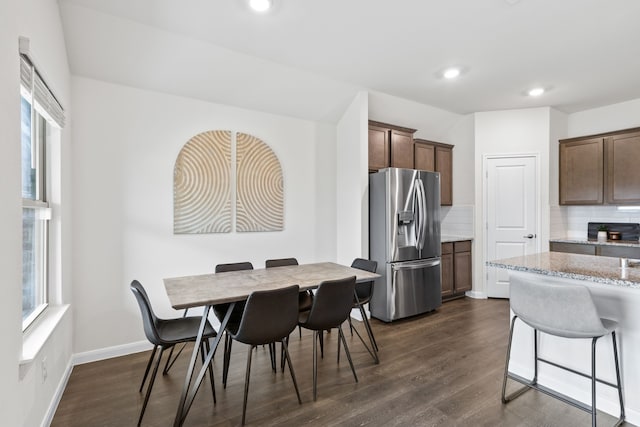 604 Stampede Ln, Princeton, TX 75407 - dining space featuring plenty of natural light, dark wood-type flooring, recessed lighting, and baseboards