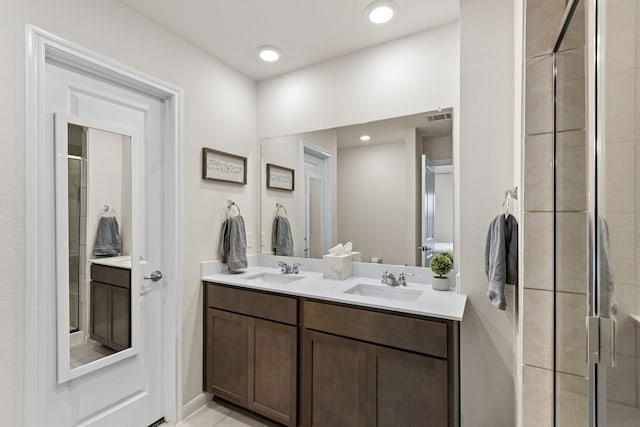 604 Stampede Ln, Princeton, TX 75407 - full bath featuring double vanity and a shower stall