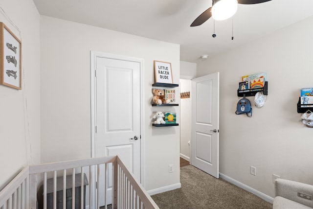 604 Stampede Ln, Princeton, TX 75407 - carpeted bedroom featuring a crib, baseboards, and ceiling fan