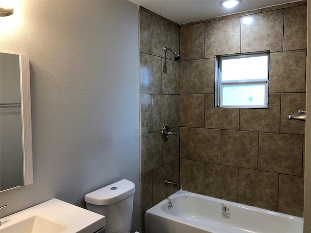 bathroom with vanity, toilet, and tub / shower combination