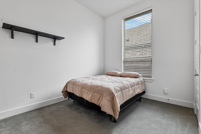 carpeted bedroom with baseboards