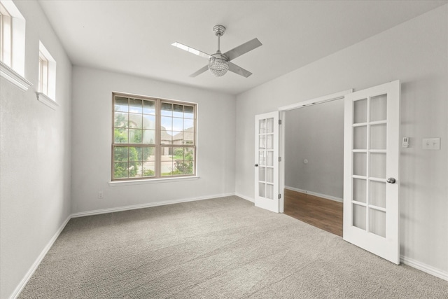 1617 Beauregard Point Dr, Wylie, TX 75098 - carpeted spare room with a healthy amount of sunlight, baseboards, a ceiling fan, and french doors