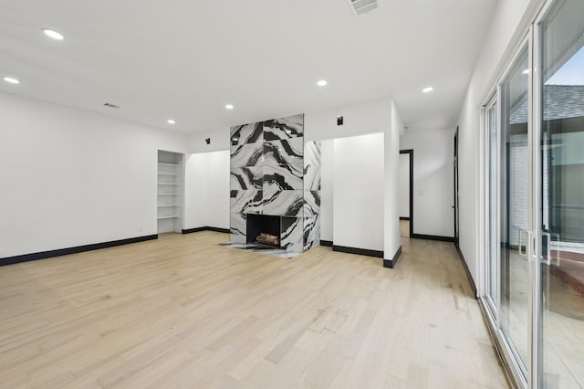 4219 Hollow Oak Dr, Dallas, TX 75287 - workout area with recessed lighting, baseboards, and light wood-style flooring