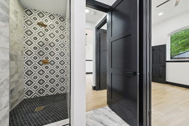 4219 Hollow Oak Dr, Dallas, TX 75287 - full bathroom featuring a tile shower and marble finish floor