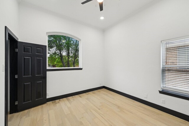 4219 Hollow Oak Dr, Dallas, TX 75287 - unfurnished room with baseboards, ceiling fan, and light wood finished floors