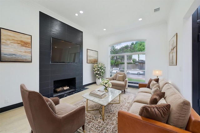 4219 Hollow Oak Dr, Dallas, TX 75287 - living room with crown molding, recessed lighting, visible vents, and light wood-style floors
