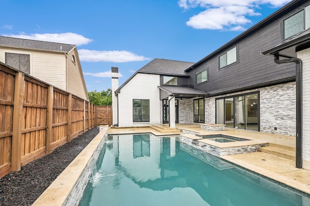 4219 Hollow Oak Dr, Dallas, TX 75287 - view of swimming pool with a fenced backyard, a pool with connected hot tub, and a patio area