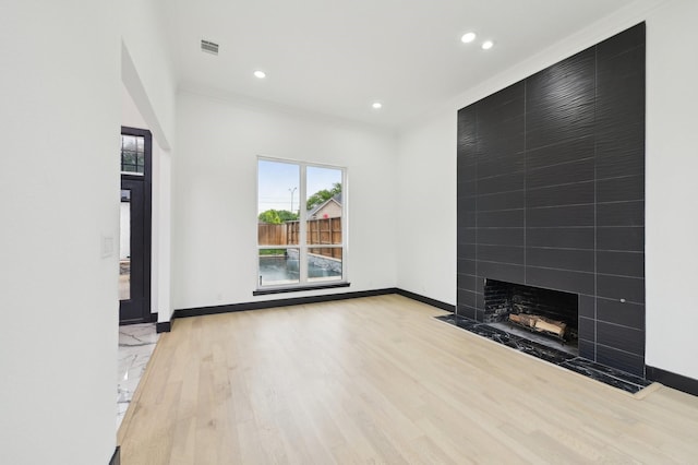 4219 Hollow Oak Dr, Dallas, TX 75287 - unfurnished living room featuring recessed lighting, baseboards, visible vents, and light wood-style flooring