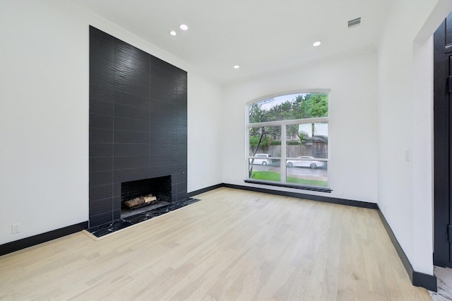4219 Hollow Oak Dr, Dallas, TX 75287 - unfurnished living room featuring baseboards and wood finished floors