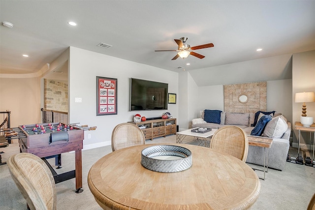 dining space with a ceiling fan, light colored carpet, visible vents, and recessed lighting