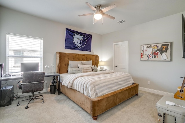 bedroom featuring carpet floors, baseboards, a ceiling fan, and visible vents