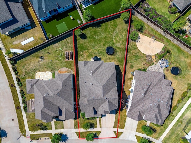 birds eye view of property with a residential view