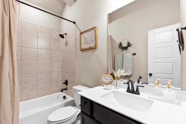 full bathroom featuring vanity, a textured wall, toilet, and shower / tub combo