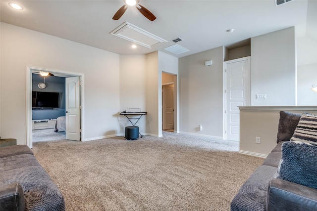 3504 Perkins Ln, Mckinney, TX 75072 - living room with visible vents, attic access, ceiling fan, and carpet flooring