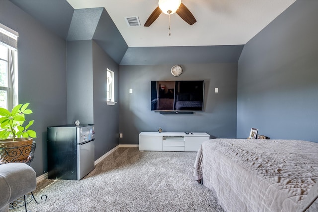3504 Perkins Ln, Mckinney, TX 75072 - carpeted bedroom featuring freestanding refrigerator, baseboards, visible vents, and multiple windows