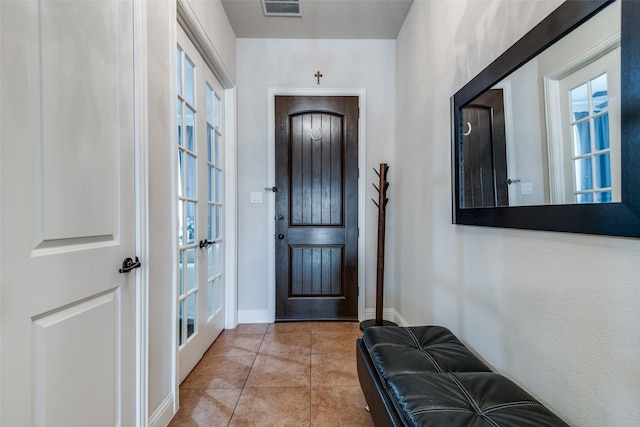 3504 Perkins Ln, Mckinney, TX 75072 - entryway featuring baseboards, visible vents, and tile patterned flooring