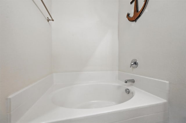 full bathroom with a garden tub