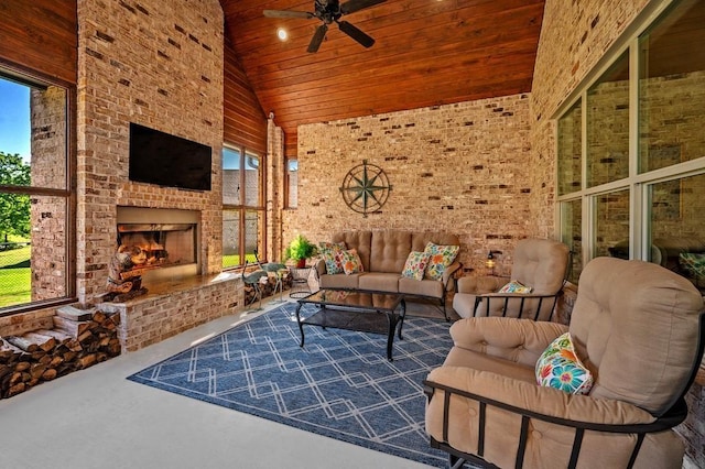 210 Tananger Springs Dr, Denison, TX 75021 - living room featuring ceiling fan, high vaulted ceiling, brick wall, wood ceiling, and an outdoor brick fireplace