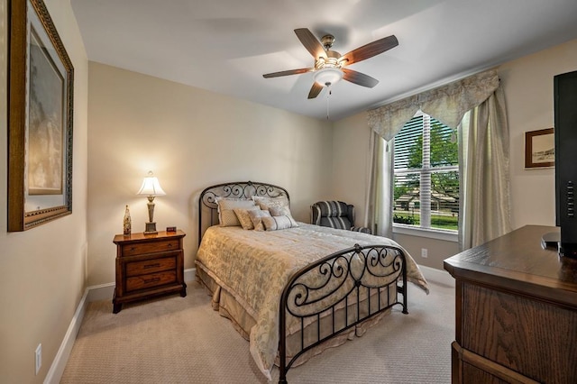 210 Tananger Springs Dr, Denison, TX 75021 - bedroom featuring light colored carpet, baseboards, and ceiling fan