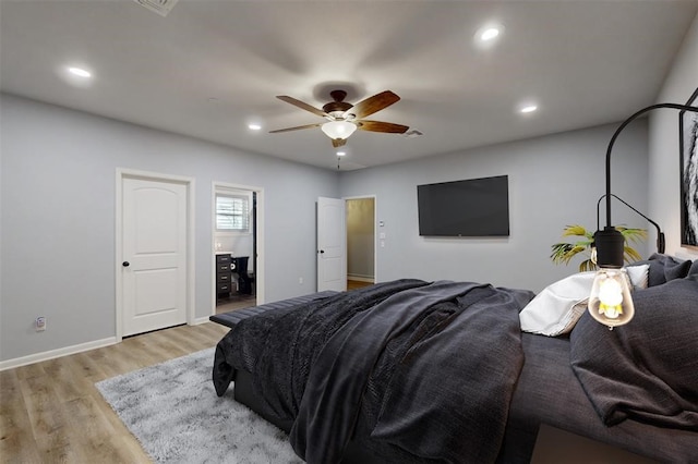 bedroom with light wood-type flooring, recessed lighting, baseboards, and ceiling fan