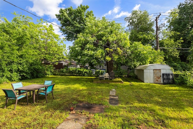 3724 Highgrove Dr, Dallas, TX 75220 - view of yard with an outdoor structure, a shed, and outdoor dining space
