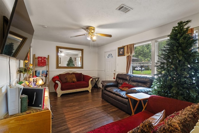 3724 Highgrove Dr, Dallas, TX 75220 - living room with visible vents, a ceiling fan, and wood finished floors