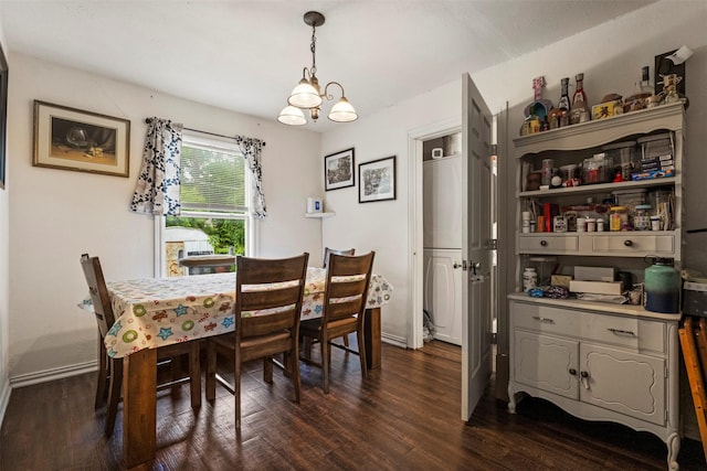 3724 Highgrove Dr, Dallas, TX 75220 - dining area with baseboards, a notable chandelier, and dark wood-style floors