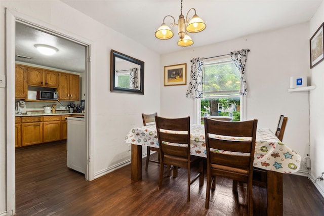 3724 Highgrove Dr, Dallas, TX 75220 - dining room featuring baseboards, dark wood finished floors, and a notable chandelier