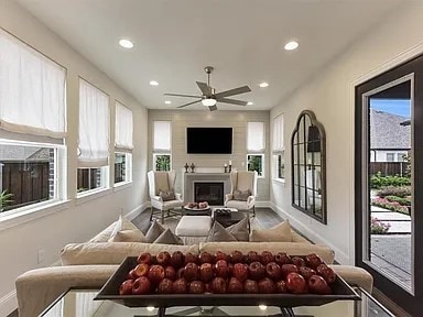 904 Devonshire Dr, Allen, TX 75013 - living room featuring recessed lighting, baseboards, plenty of natural light, and a ceiling fan