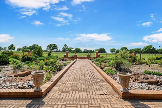 surrounding community featuring fence