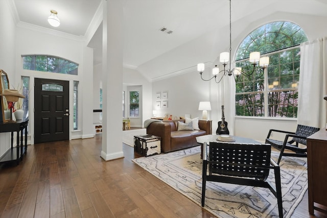 8926 White Pine Ln, Dallas, TX 75238 - entryway featuring visible vents, ornamental molding, a wealth of natural light, and dark wood-type flooring