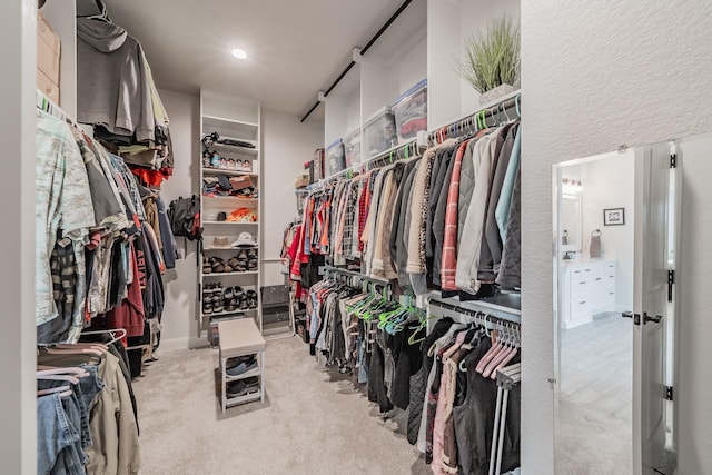 spacious closet featuring carpet