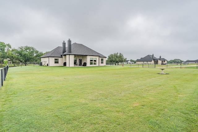 view of yard featuring a fenced backyard and a patio area