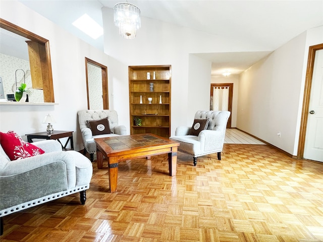 sitting room with baseboards and lofted ceiling