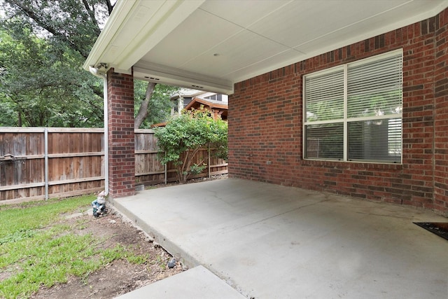 view of patio / terrace with fence