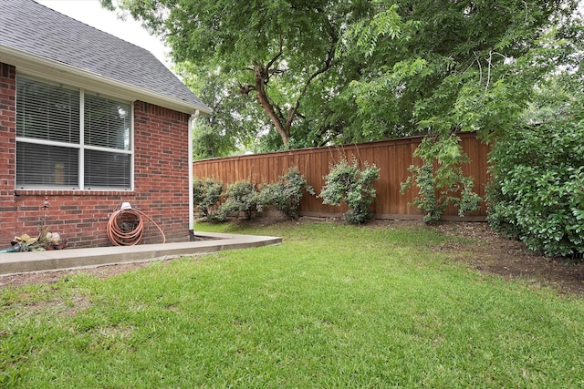 view of yard featuring fence private yard