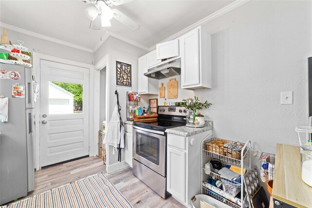 2612 1st St, Brownwood, TX 76801 - kitchen featuring stainless steel appliances, under cabinet range hood, light wood-style flooring, white cabinets, and crown molding