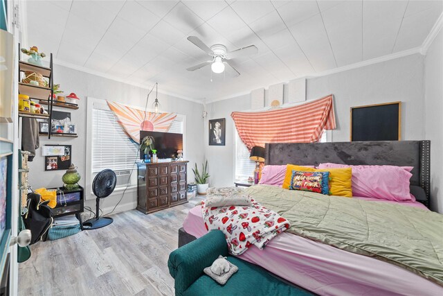 2612 1st St, Brownwood, TX 76801 - bedroom with ornamental molding, wood finished floors, and ceiling fan